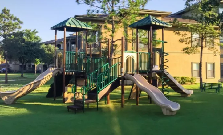 Playground on turf grass | Nampa Floors
