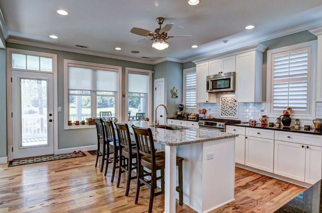 granite countertops and kitchen island in modern, open kitchen | Boise, Idaho | Nampa Flooring