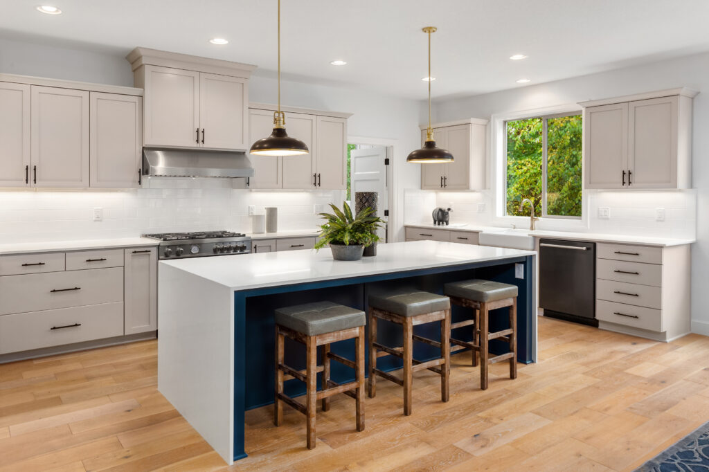 white quartz countertops in a modern, open kitchen | Boise Idaho | Nampa Flooring